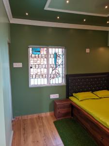 Postel nebo postele na pokoji v ubytování Pravuprasad Homestay