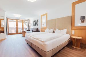 Letto o letti in una camera di Hotel Weisseespitze