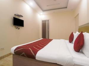 Postel nebo postele na pokoji v ubytování Hotel Grace, Karol Bagh, New Delhi