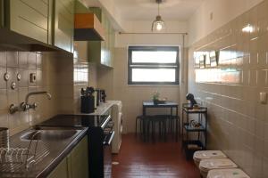 Η κουζίνα ή μικρή κουζίνα στο Magic Land Apartment