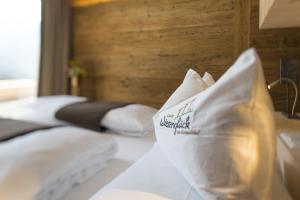 Posteľ alebo postele v izbe v ubytovaní Chalet Wiesenglück
