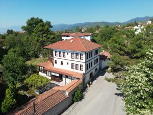 an aerial view of a large white house with a red roof at Dibekönü Konak in Safranbolu