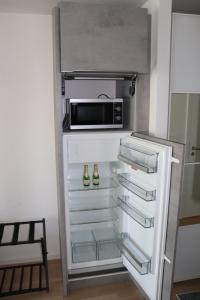 Kuchyň nebo kuchyňský kout v ubytování Luxus Apartment in Burghausen