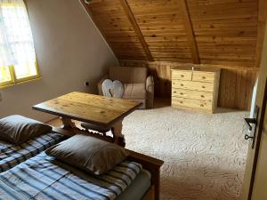 Postel nebo postele na pokoji v ubytování Chalupa U Měšťanů
