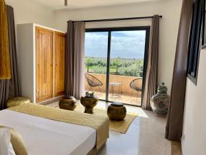 Postel nebo postele na pokoji v ubytování LE JASMIN DE MARRAKECH + 37 fotografií