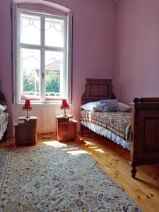 Rúm í herbergi á Apartmani Dragulj