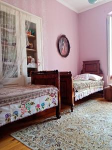 Rúm í herbergi á Apartmani Dragulj