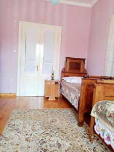 Rúm í herbergi á Apartmani Dragulj