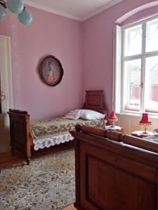 Rúm í herbergi á Apartmani Dragulj