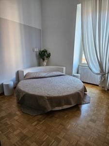 Posteľ alebo postele v izbe v ubytovaní Apartment Rome 18