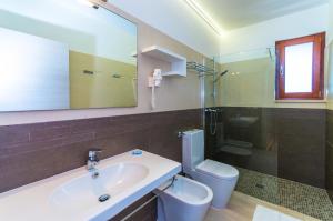 Ванная комната в Villaggio Mare Blu