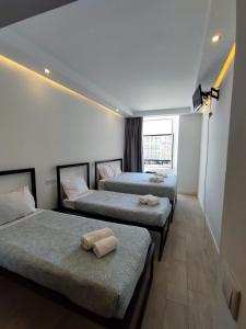 Postel nebo postele na pokoji v ubytování Figueira House in Beira Minho