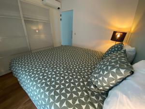 Ein Bett oder Betten in einem Zimmer der Unterkunft Bella Vie, rust en ontspanning