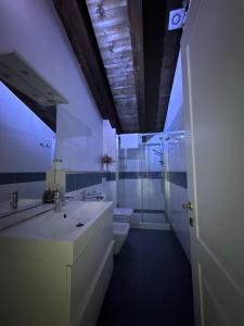 Koupelna v ubytování Piuma apartment + 22 fotografií