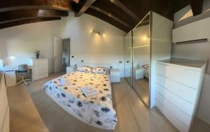 Postel nebo postele na pokoji v ubytování Piuma apartment