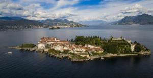 an island in the middle of a large body of water at Isola Bella Apartments Via Vittorio Emanuele in Stresa
