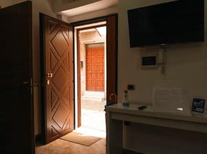 TV a/nebo společenská místnost v ubytování Casa Vico Primo + 4 fotografie