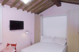 Katil atau katil-katil dalam bilik di Monolocale per due Agriturismo le Pinete