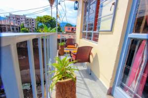 Un balcon sau o terasă la Citizen Cafe & Chambers