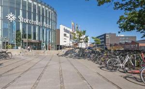 a row of bikes parked in front of a building at Aarhus - cozy house, 10 min from city center in Aarhus