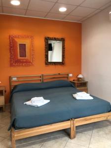 Posteľ alebo postele v izbe v ubytovaní Ospitati - B&B Sangro