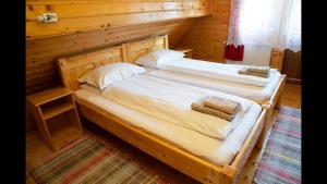 Cama o camas de una habitación en Casa dintre Brazi