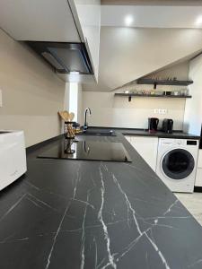 Η κουζίνα ή μικρή κουζίνα στο Muki House