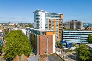 an aerial view of a city with tall buildings at Curlew in Poole