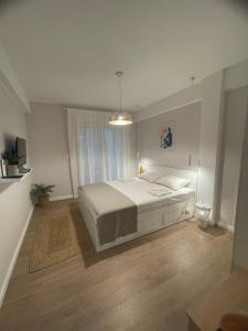 Postel nebo postele na pokoji v ubytování Sea Esta Apartment