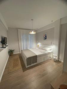 Posteľ alebo postele v izbe v ubytovaní Sea Esta Apartment