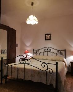 Residenza Mediterraneo tesisinde bir odada yatak veya yataklar