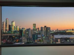 Nespecifikovaný výhled na destinaci Soul nebo výhled na město při pohledu z apartmánu