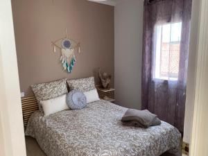 Posteľ alebo postele v izbe v ubytovaní Cosy apartment of l'Escala Beach + 15 fotografií