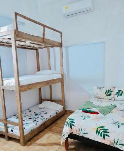 Postel nebo postele na pokoji v ubytování Hostal Badillo SV