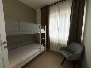 Poschodová posteľ alebo postele v izbe v ubytovaní The Hedge Apartments