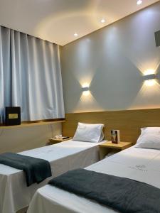Cama o camas de una habitación en Hotel Urban