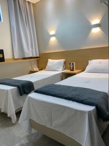 Katil atau katil-katil dalam bilik di Hotel Urban