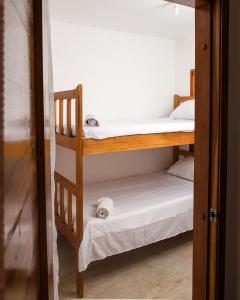 Postel nebo postele na pokoji v ubytování HOSTAL LA BOQUILLA