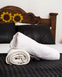 Postel nebo postele na pokoji v ubytování HOSTAL LA BOQUILLA