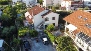 an aerial view of a house in a city at Apartments Reinić in Novigrad Istria