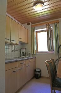 Kuchyň nebo kuchyňský kout v ubytování Appartementhaus Wehrenfennig