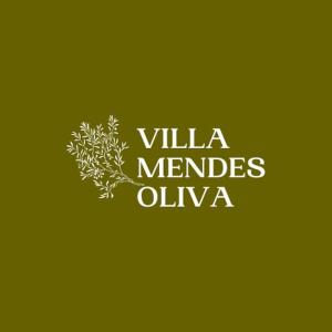a green sign with the words villa members oliva at Villa Mendes Oliva in Almeida