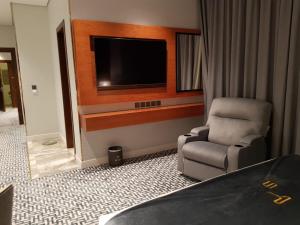 TV a/nebo společenská místnost v ubytování STwin Hotel