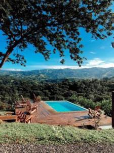 a swimming pool with a view of the mountains at Luxury Villa Caoba- Private, Serene, Amazing Views in San Mateo