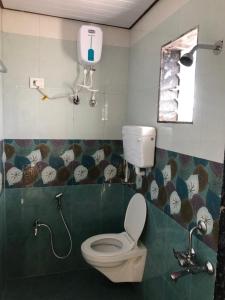 Ett badrum på Bahawa Retreat
