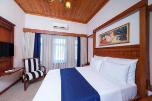 Postel nebo postele na pokoji v ubytování Hotel Bosnali