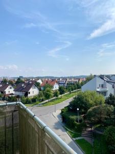 a view of a street from a balcony at Apartment Storczykowa Airport in Gdańsk