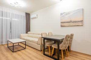 Posezení v ubytování Dulamerovic Hotel
