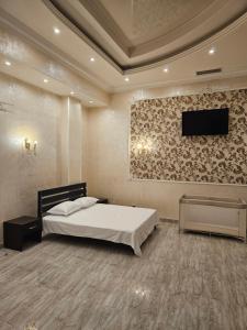 Letto o letti in una camera di Dostoevsky Hotel Աղ ու Հաց FOOD COURT