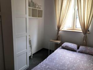 Posteľ alebo postele v izbe v ubytovaní Master Corner Apartment